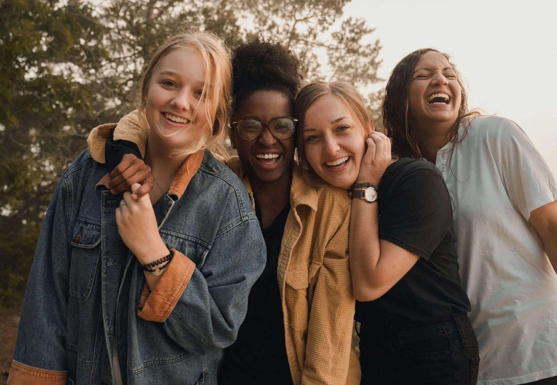 Petal - Girls Club members laughing together outdoors